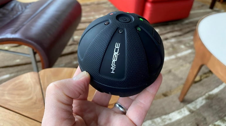 Hyperice Hypersphere Mini massage ball is about the size of a...