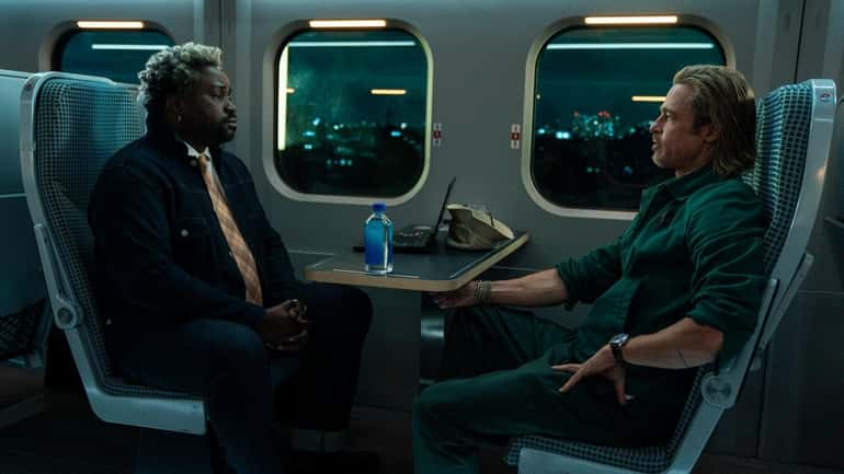 Bryan Tyree Henry, left, and Brad Pitt star in a...