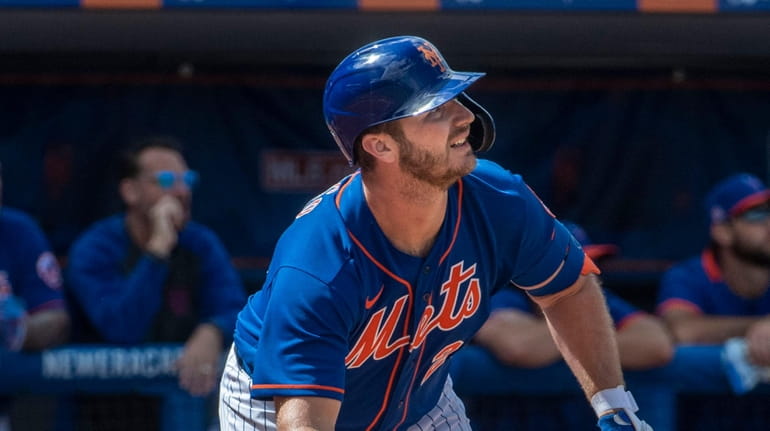 Mets' Pete Alonso bats during a spring training game against...