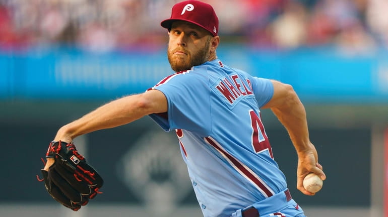 Philadelphia Phillies pitcher Zack Wheeler winds up during the first...
