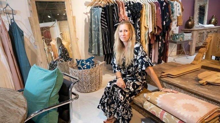 LIDO owner Heidi Kelso, poses inside her shop in Greenport...