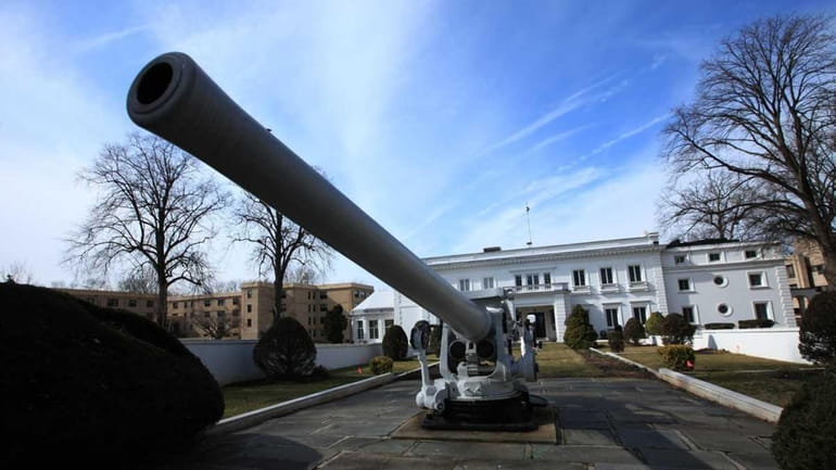 A historic naval gun marks the approach to Wiley Hall...