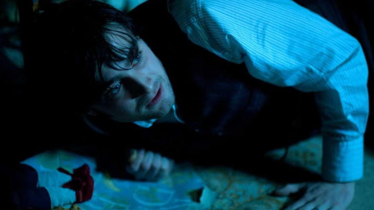 Daniel Radcliffe as Arthur Kipps in the 2012 horror film...