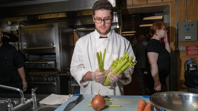 Joshua Stechman of Bellmore in a cooking class at Nassau Community College....