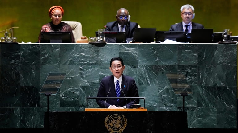 Japan's Prime Minister Fumio Kishida, bottom, addresses the 78th session...
