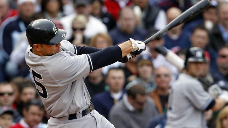 The Yankees' Russell Martin hits a home run against the...
