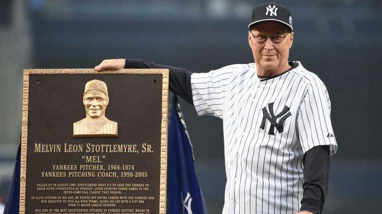 Former Yankees pitcher and pitching coach Mel Stottlemyre admires his...