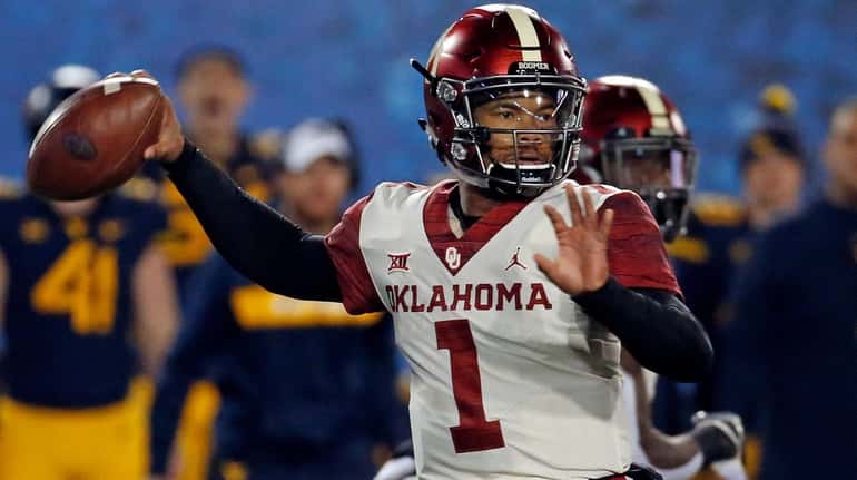 Kyler Murray of the Oklahoma Sooners passes against the West...