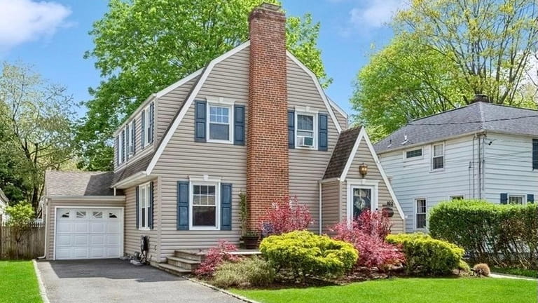 This $789,000 Stewart Manor Colonial has three bedrooms.