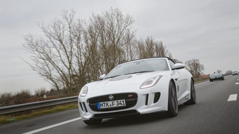 The 2014 Jaguar F-Type comes equipped with a rear spoiler...