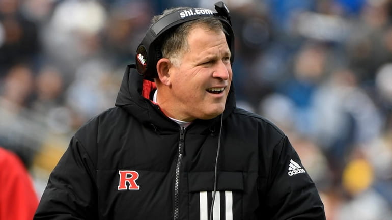 Rutgers coach Greg Schiano watches the team play Penn State...