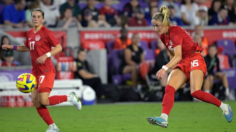 Canada forward Janine Beckie (16) attempts a shot on goal...