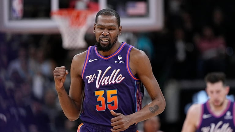 Phoenix Suns forward Kevin Durant (35) reacts after scoring against...