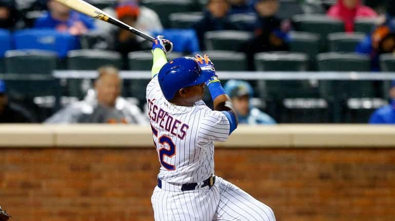 Yoenis Cespedes drives a grand slam to leftfield to cap...