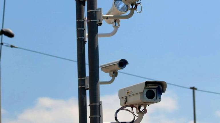 Red-light cameras on Old Country Road and Ring Road in...