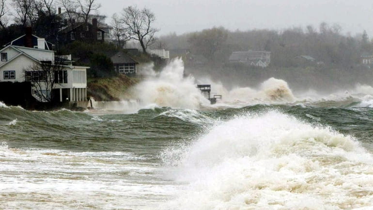 Waves pummel Southold Town Beach during Superstorm Sandy in October 2012.