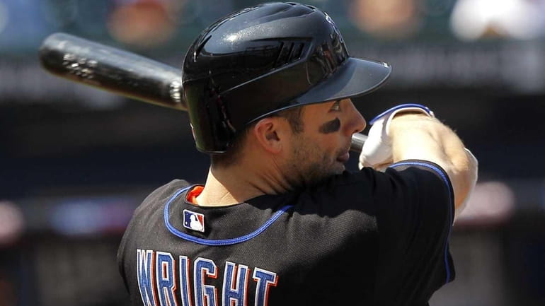 New York Mets' David Wright watches his two-run home run...