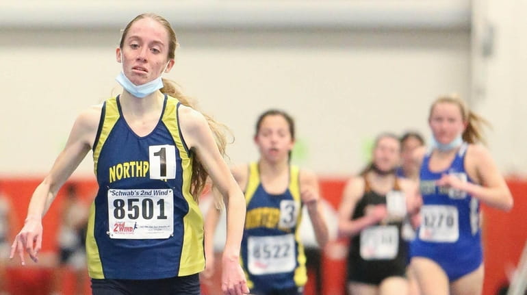 Northport's Allison Reid wins the 3000 meter run during the...