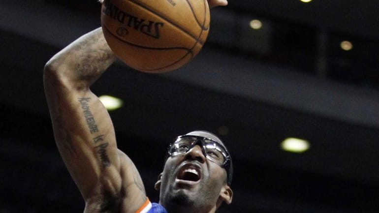 Knicks forward Amar'e Stoudemire dunks against the Detroit Pistons during...