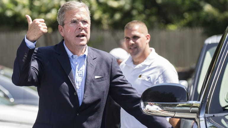 Republican presidential candidate Jeb Bush departs from the Hampton Synagogue...