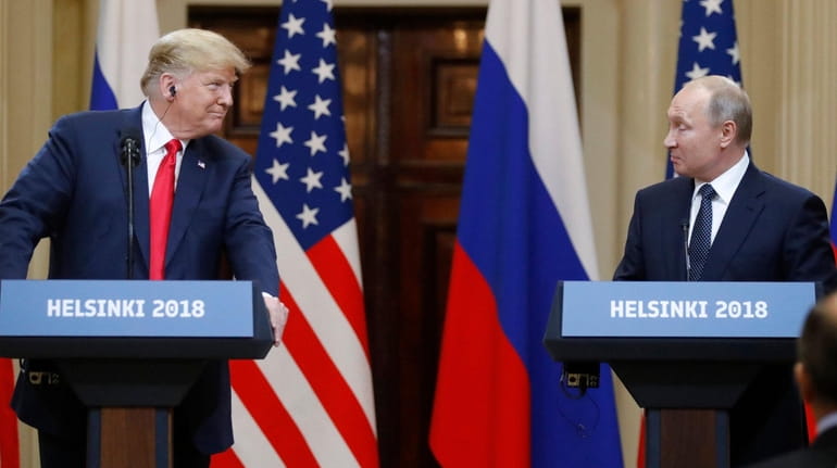 President Donald Trump and Russian President Vladimir Putin during a news...