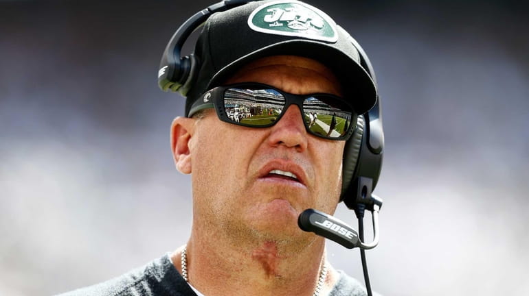 Jets head coach Rex Ryan looks on from the sideline...