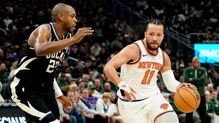 The Knicks' Jalen Brunson drives to the basket against the...