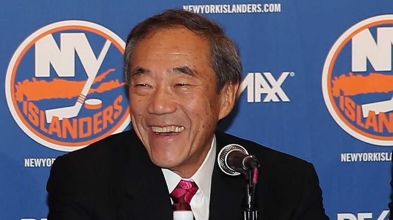 New York Islanders owner Charles Wang speaks with the media...