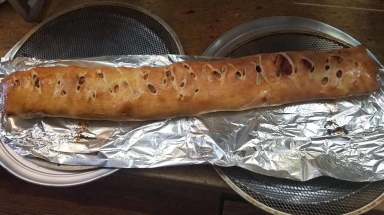 This three-foot chicken roll, among other food, must be eaten...