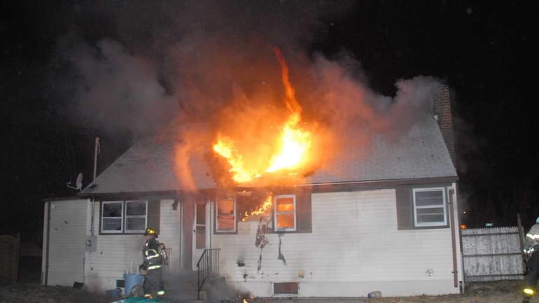 Copiague firefighters respond early Friday morning to a house fire...