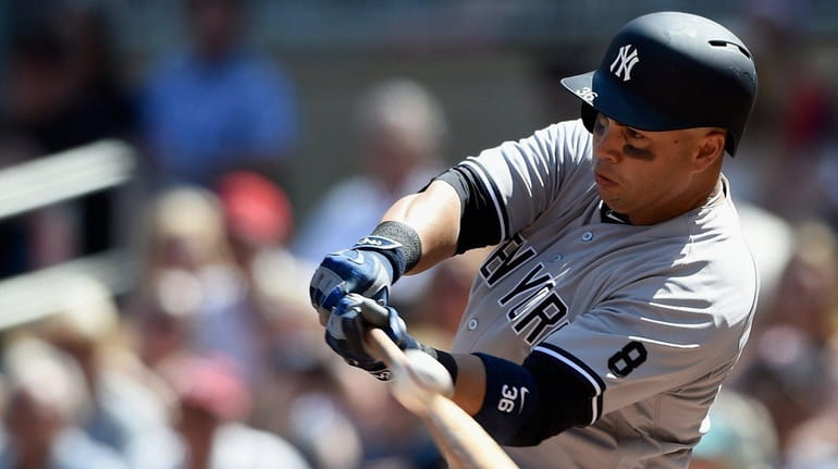 Carlos Beltran #36 of the New York Yankees hits a...