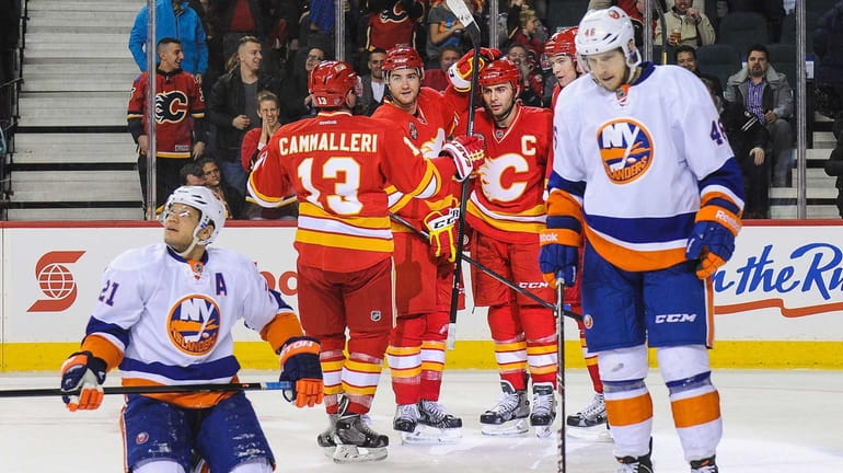 From left, Mike Cammalleri, T.J. Brodie, Mark Giordano, and Joe...