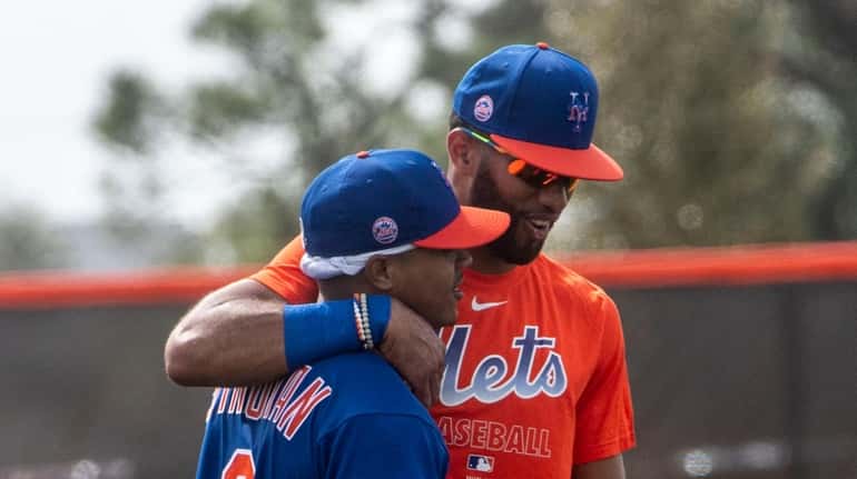 Mets players Marcus Stroman (left) and Amed Rosario during a spring...
