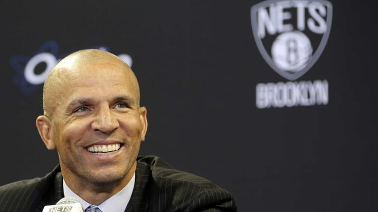Brooklyn Nets head coach Jason Kidd smiles as he speaks...