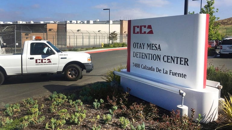 A vehicle drives into the Otay Mesa detention center in...