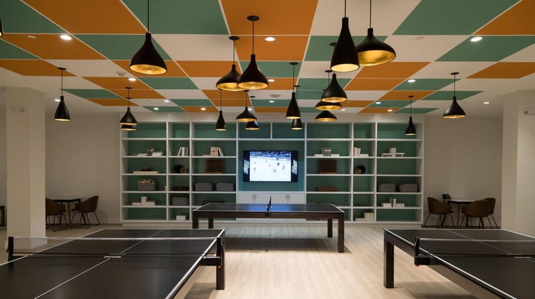 A game room in the clubhouse at Country Pointe in...