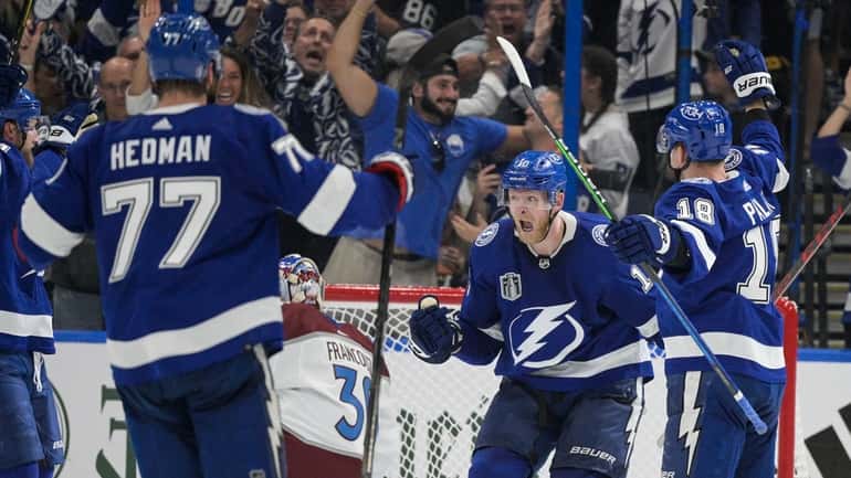 Tampa Bay Lightning right wing Corey Perry celebrates a goal...