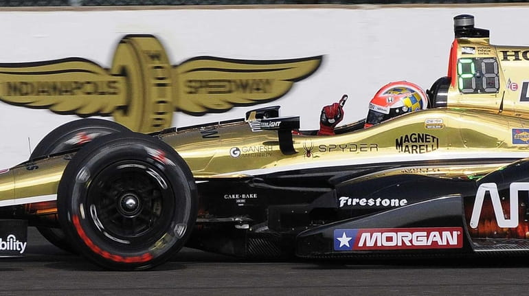 James Hinchcliffe celebrates after winning the pole for the Indianapolis...