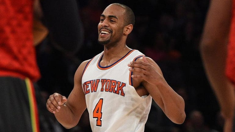 New York Knicks guard Arron Afflalo reacts after sinking a...