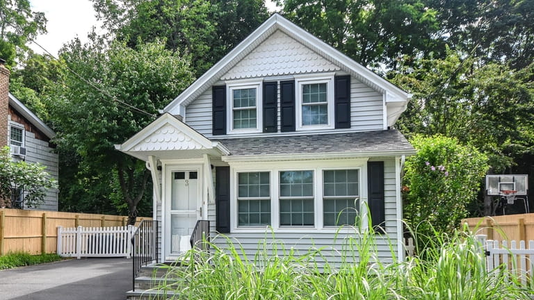 Priced at $649,000, this Colonial on Vine Street has new...