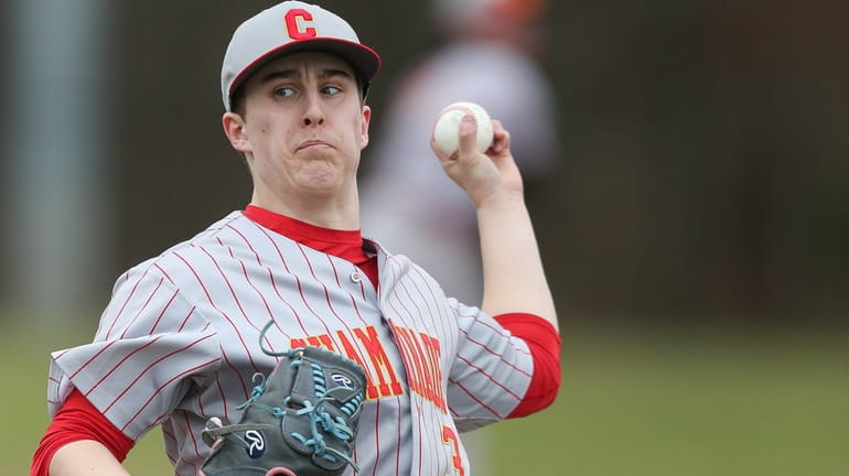 Chaminade's John Carroll throws a pitch in the first inning against...