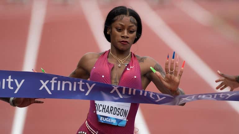 United States' Sha'Carri Richardson comes in second place in the...
