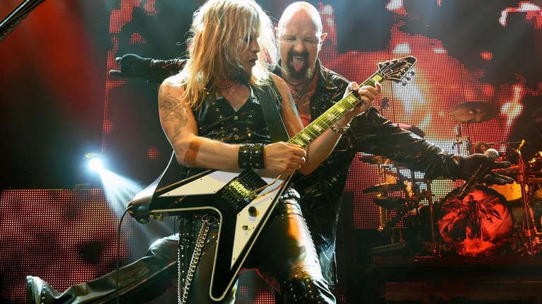 Richie Faulkner (L) and  Rob Halford of Judas Priest perform...