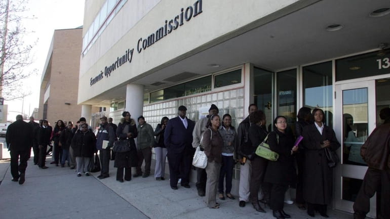Job seekers line up in January 2010 to get into...