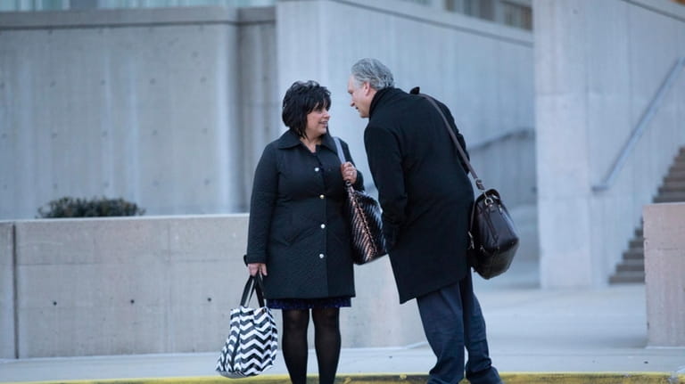 Linda and Edward Mangano leave federal court in Central Islip...
