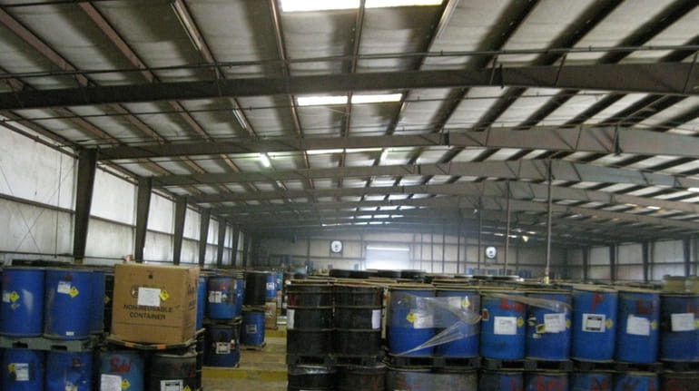 Waste containers in a warehouse in Valdosta, Georgia, that were...