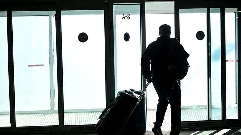 A passenger leaves Long Island MacArthur Airport recently. A recent Cirium...