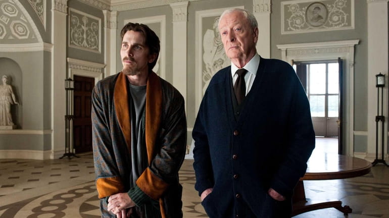 Christian Bale as Bruce Wayne, left, and Michael Caine as...
