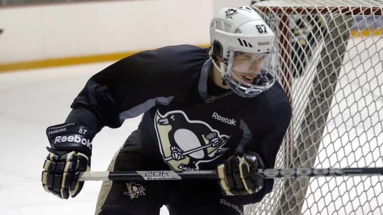 Pittsburgh Penguins' Sidney Crosby participates with the team at practice...