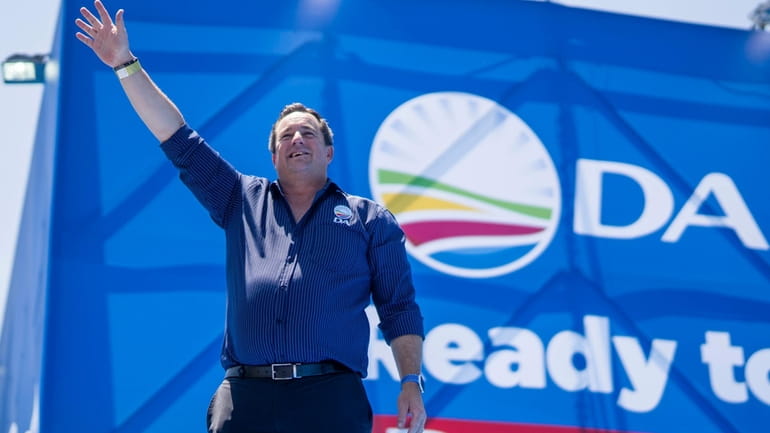 Opposition Democratic Alliance party leader john Steenhuisen waves at supporters...